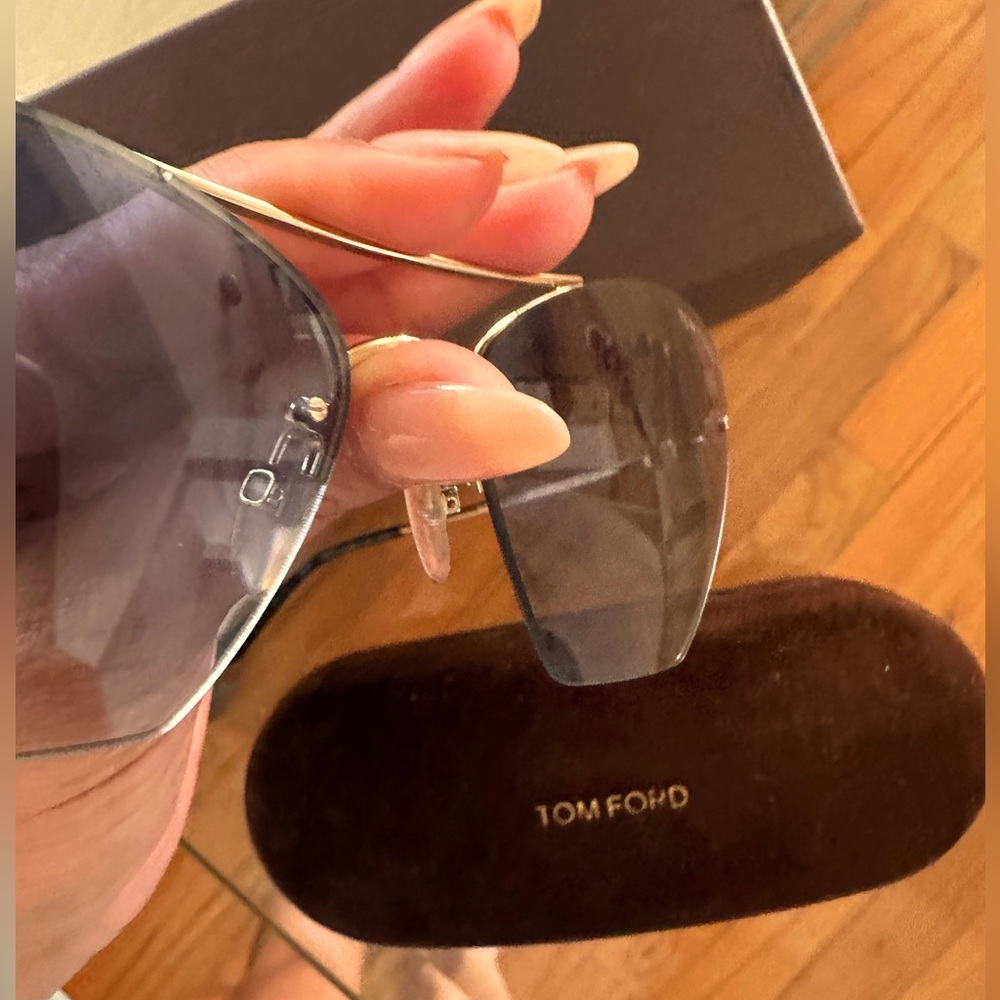 Tom Ford blue tint frameless glasses